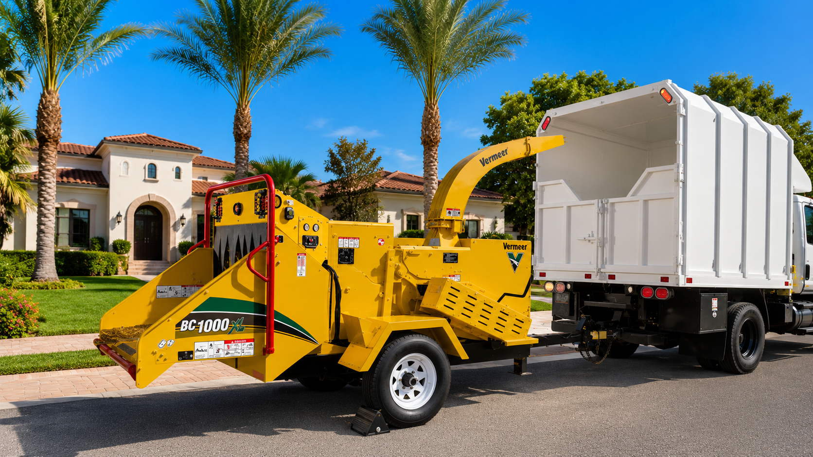 Vermeer BC1000 chipper and RC TREE Services crew truck in Scottsdale Arizona
